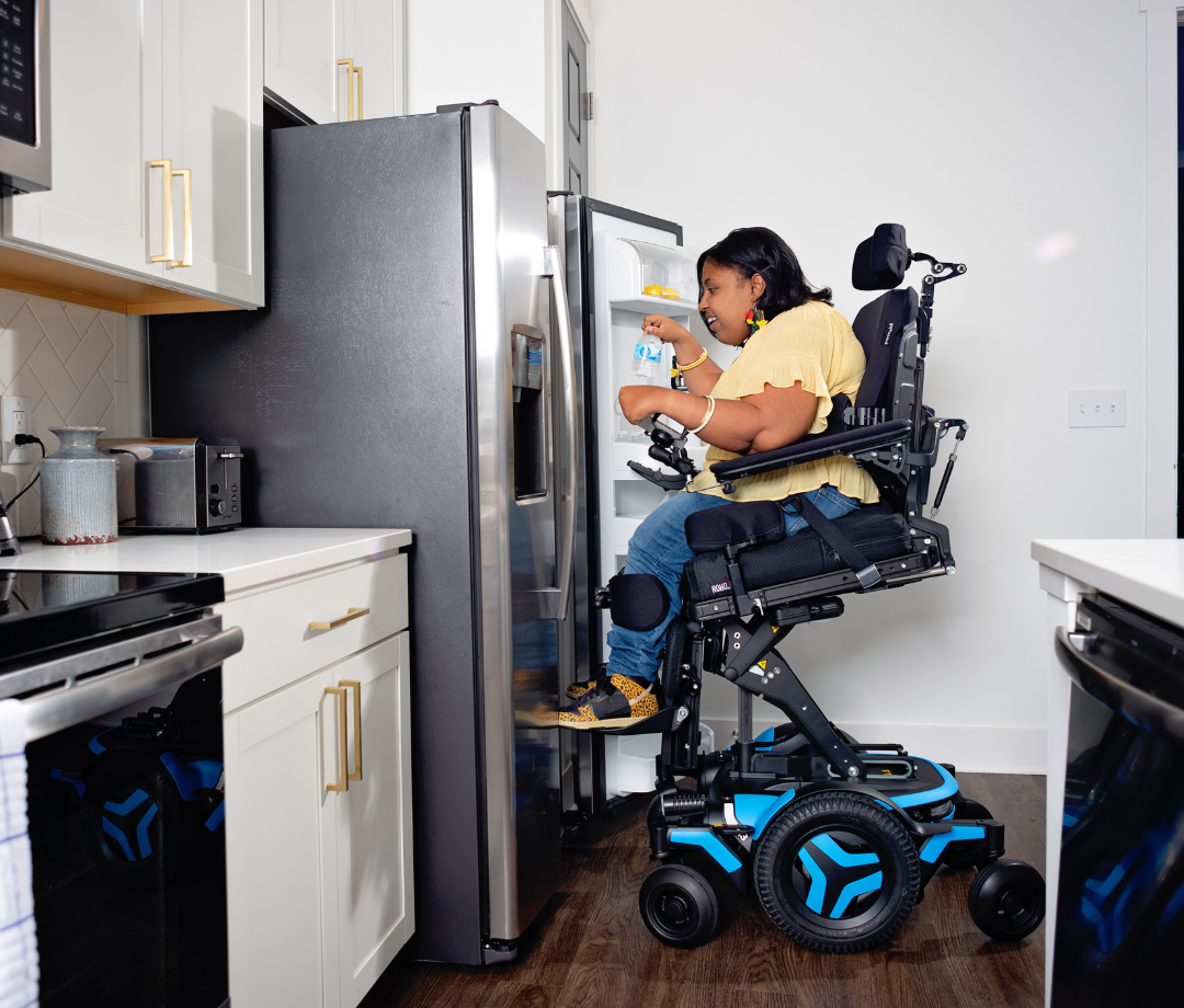 Person using a complex rehab power wheelchair at home